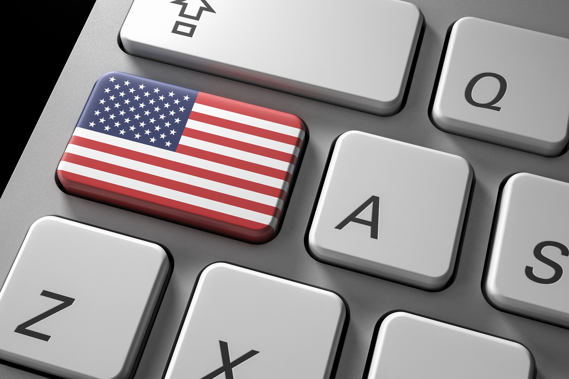 Keyboard with an American flag on a key symbolizing English medical translation services.